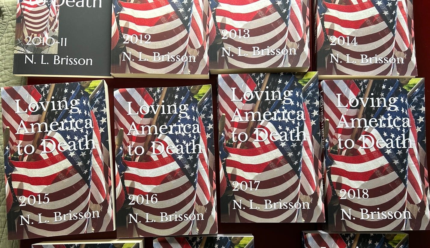 A group of books with american flags

Description automatically generated