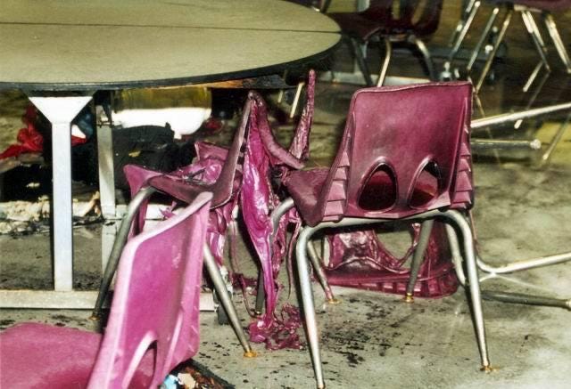 Melted plastic chairs in the Columbine Highschool cafeteria after the  massacre. One of the shooters, Dylan Klebold, had thrown a molotov cocktail  in an attempt to set off one of the larger