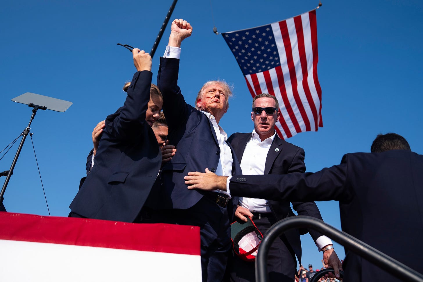 Donald Trump holding up his fist.