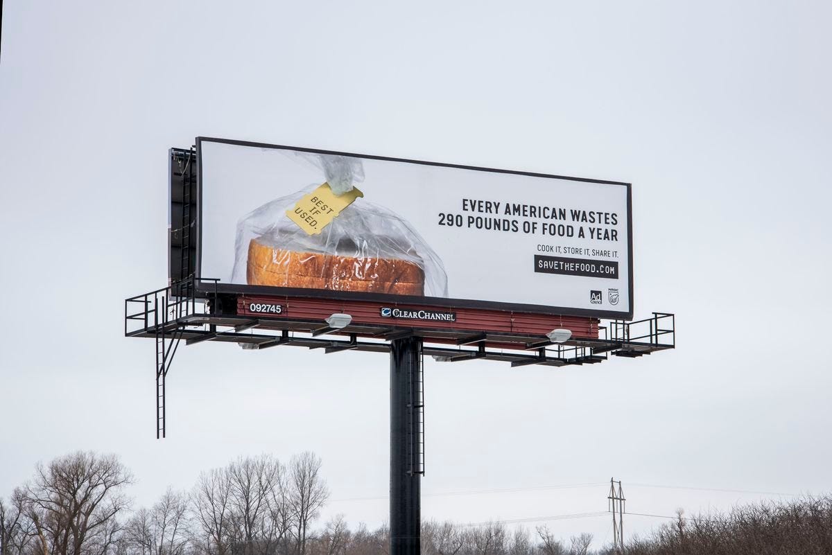 A billboard telling how much food Americans waste every year