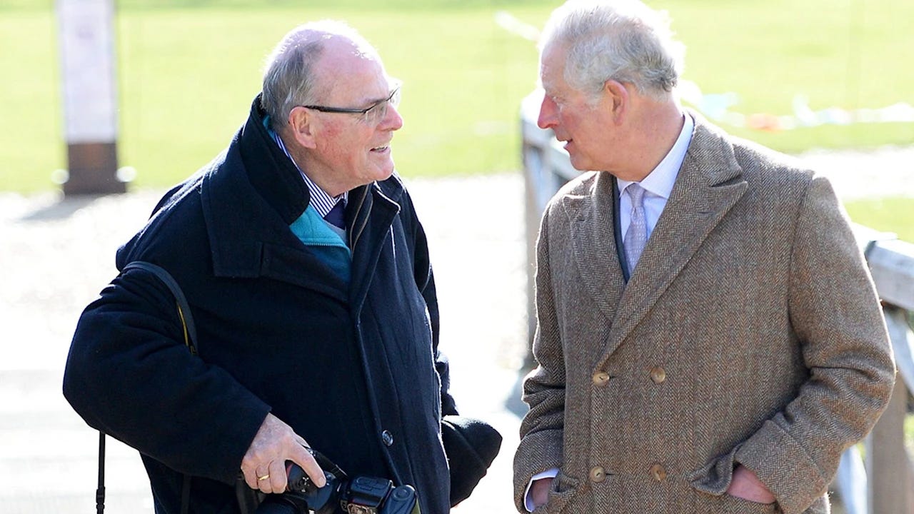 King Charles talking to Arthur Edwards