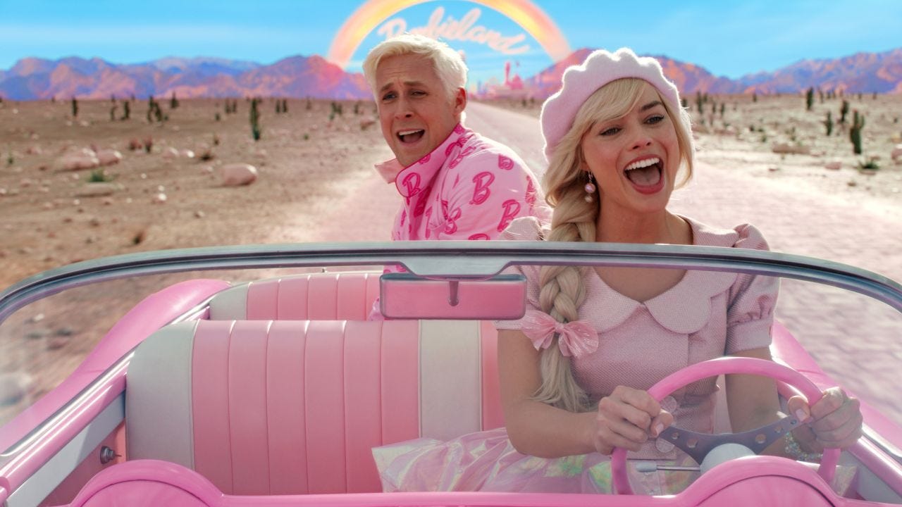 Barbie and Ken singing in the barbie dream car, on the road to the real world