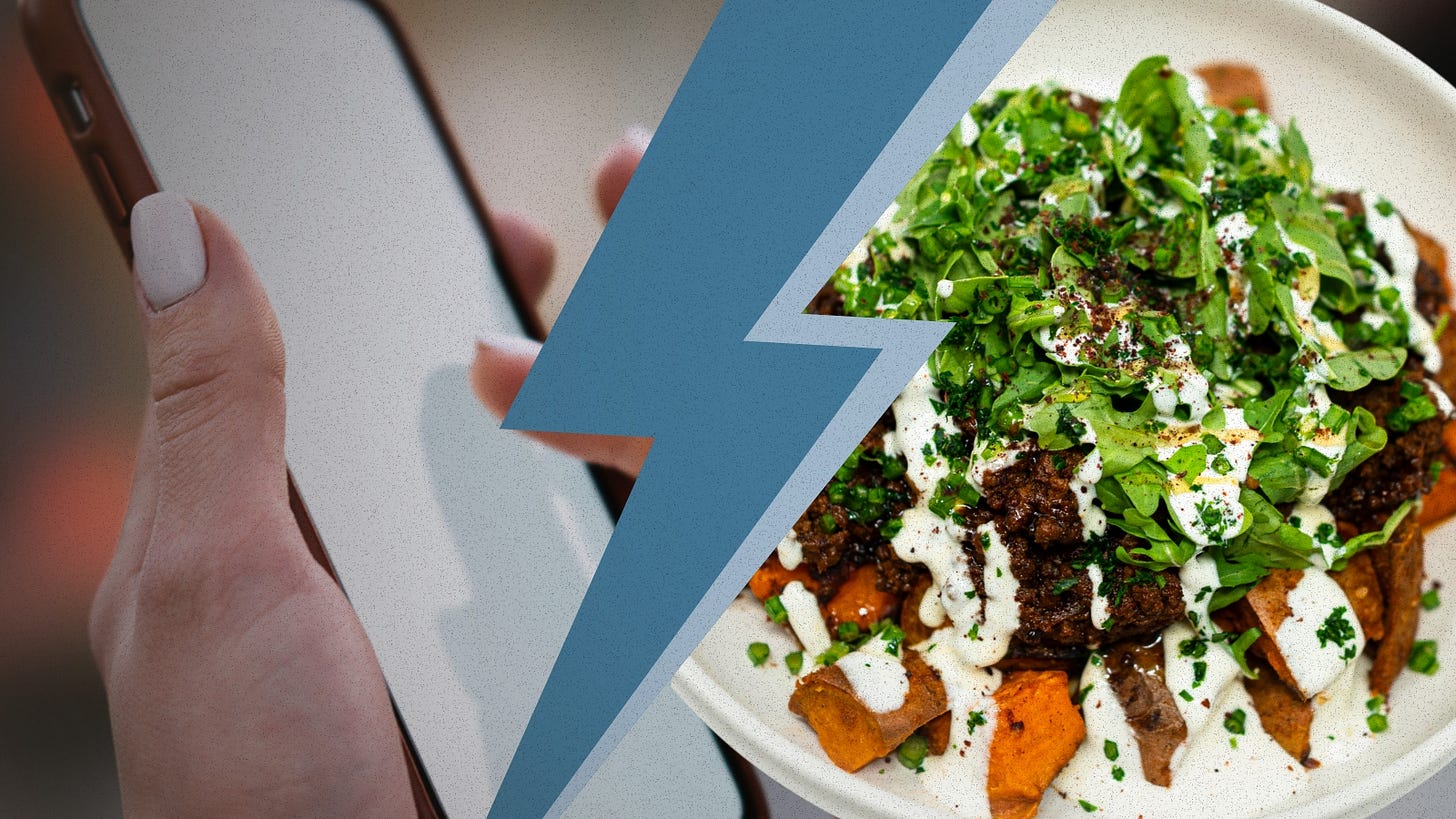 Hand holding smartphone next to a bowl containing miso honey ground beef with roasted sweet potatoes, fresh greens, and white cottage cheese sauce drizzled on top, illustrating viral TikTok food trends.