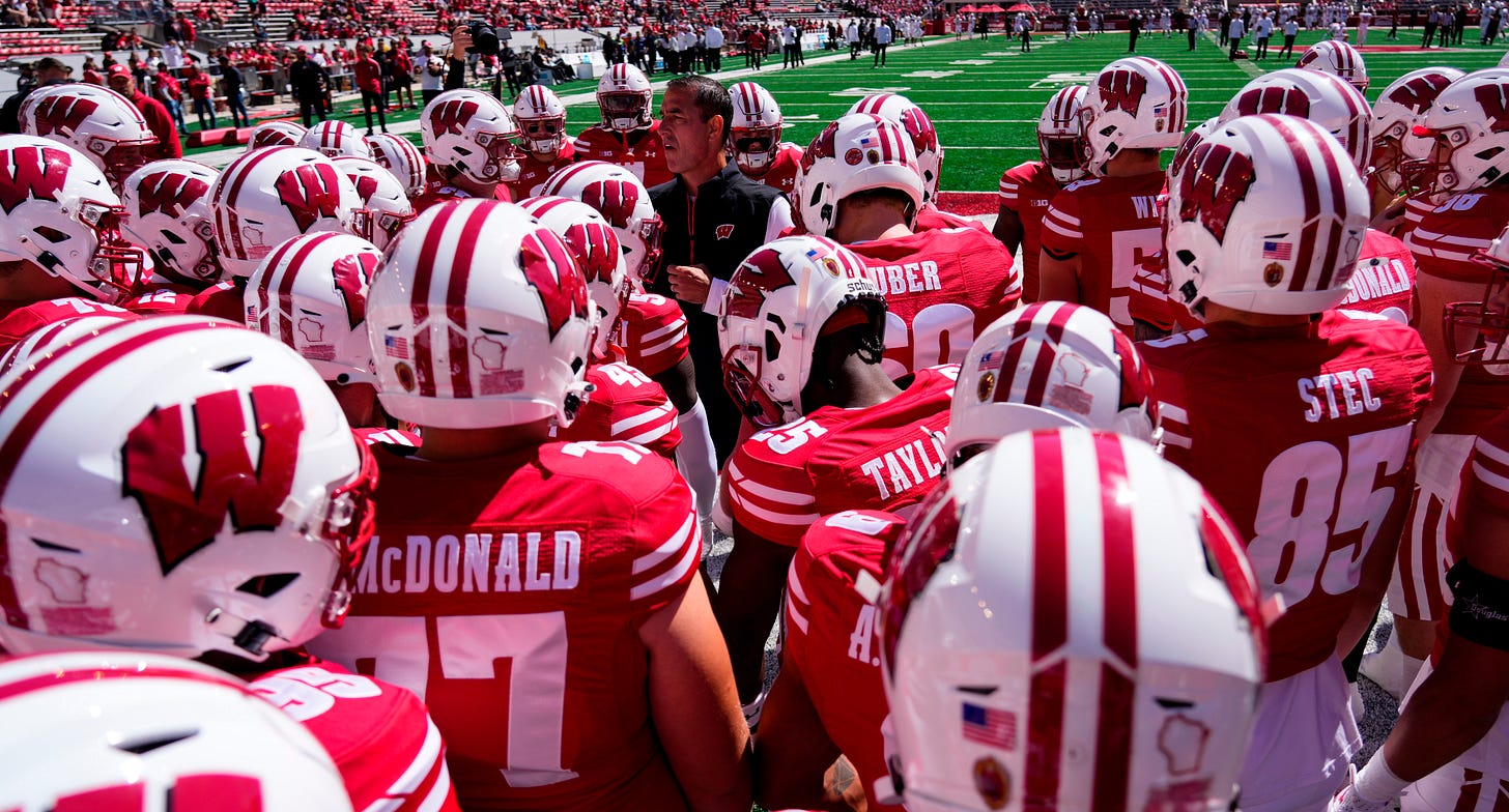 Wisconsin Badgers head football coach Luke Fickell addresses the team before a home game at Camp Randall