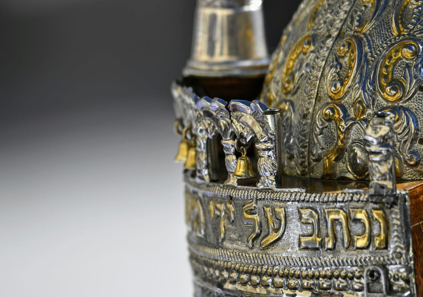 a metallic Torah crown