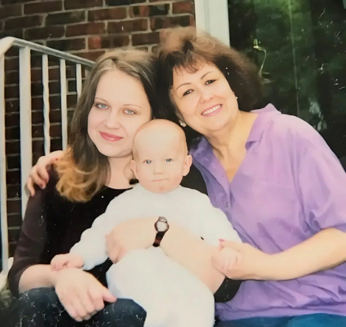 Mom, me and my baby son sitting on her stoop