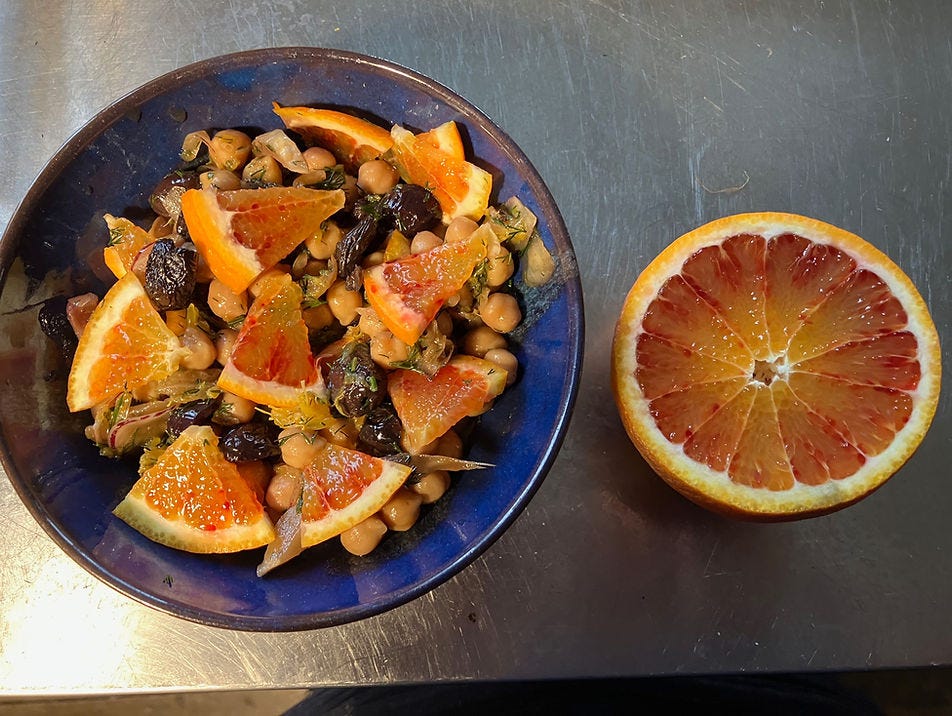 Low-calorie-dense weight-loss salad of chickpeas, roast fennel, tarocco orange, and black olives