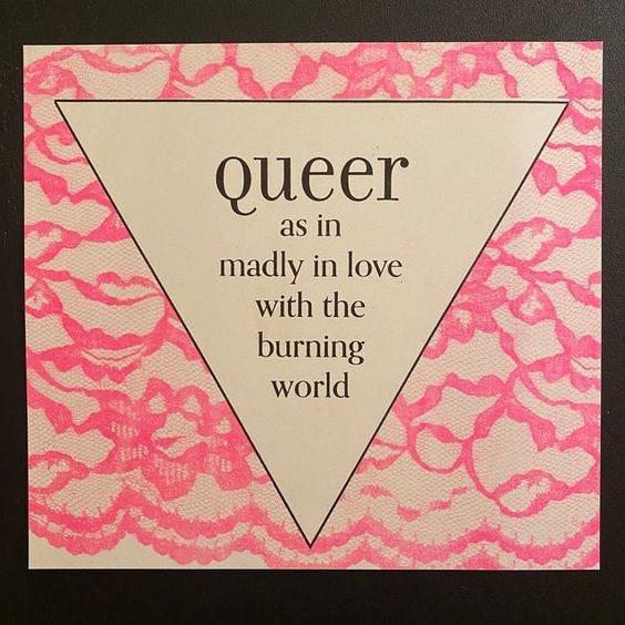 This may contain: a pink and white print with the words queen as in madly in love with the burning world