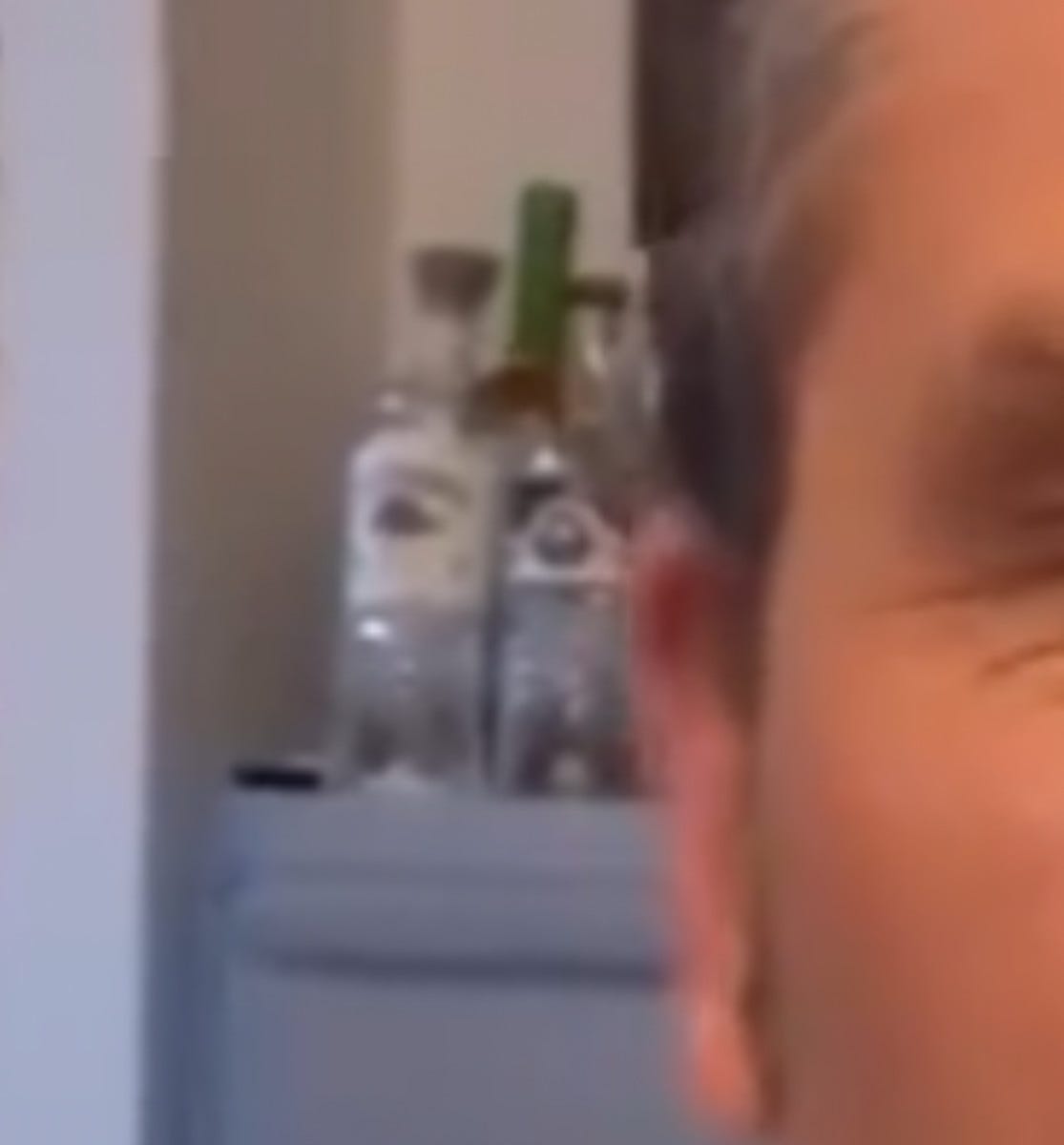 Bottles behind Pete Hegseth in his Fox News office