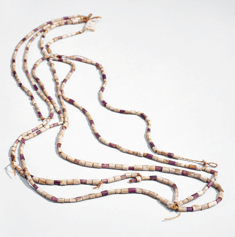 Fig. 4. Wampum strings. Northeastern North America, late 16th-early 17th centuries. Quahog (Mercenaria mercenaria), whelk, plant fibers, 10 x 12 cm. Paris, Musée du quai Branly–Jacques Chirac, 71.1934.33.494 D. Long term-loan from the Versailles Public Library.