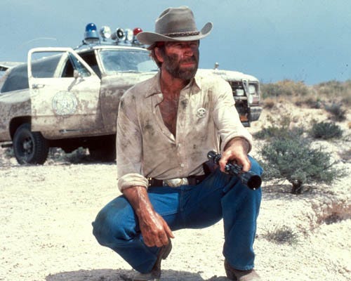 https://cdn10.bigcommerce.com/s-x8dfmo/products/2400/images/25458/Chuck-Norris-in-Lone-Wolf-McQuade-Premium-Photograph-and-Poster-1008412__41417.1432419104.1280.1280.jpg?c=2