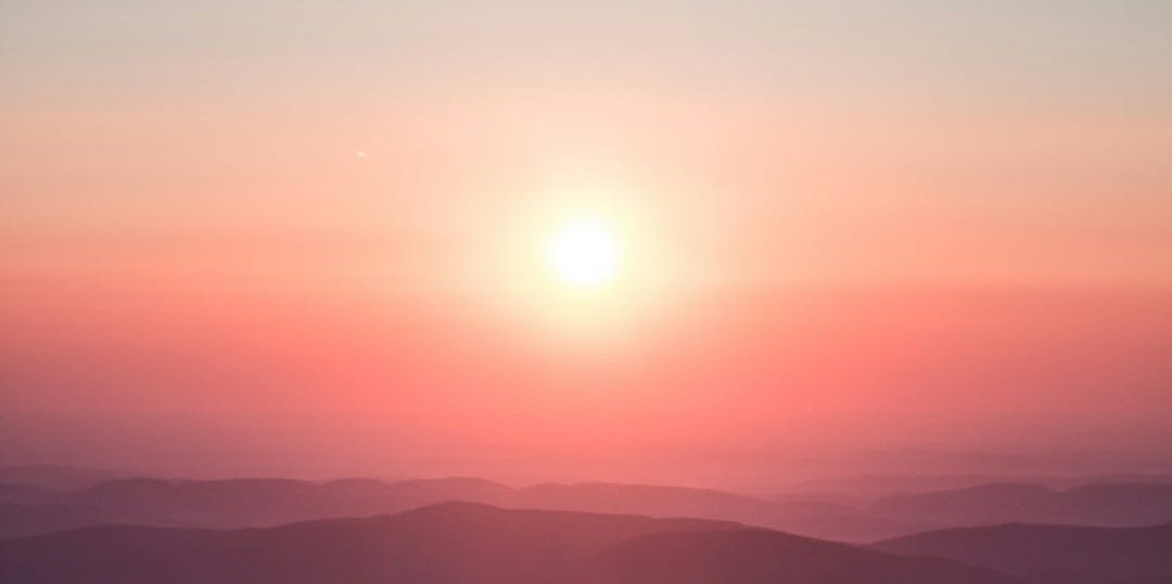 aerial view of mountain during golden hour