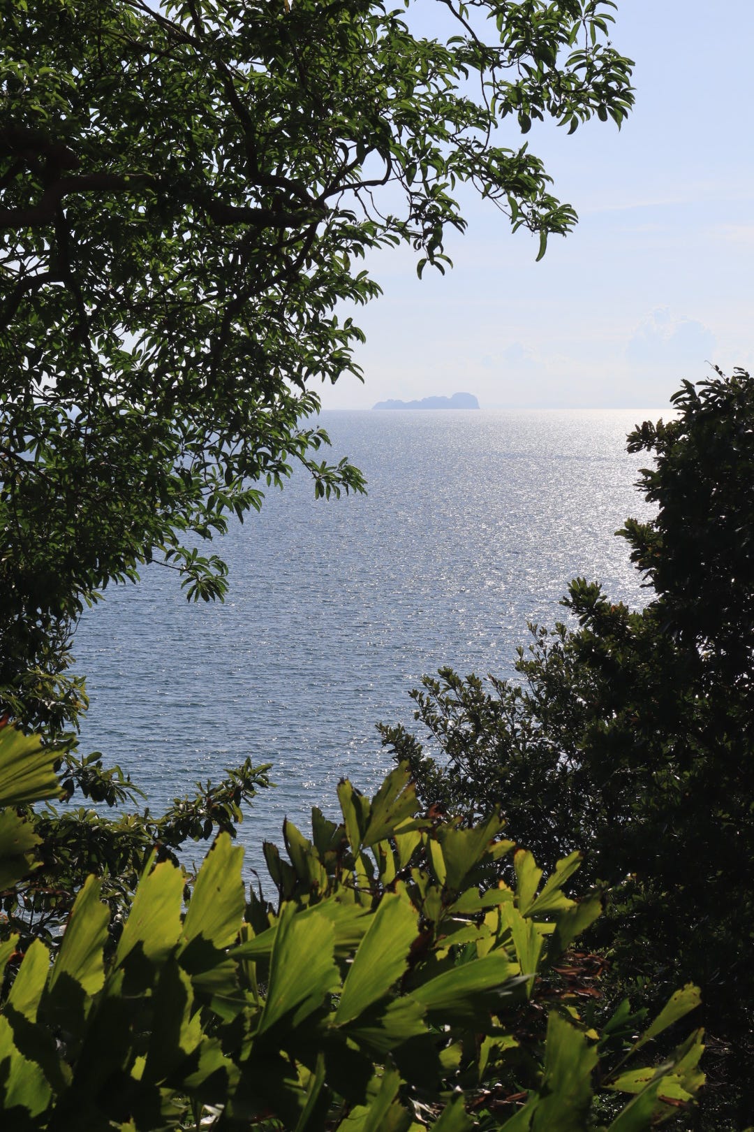 Ocean overlooking island on horizon