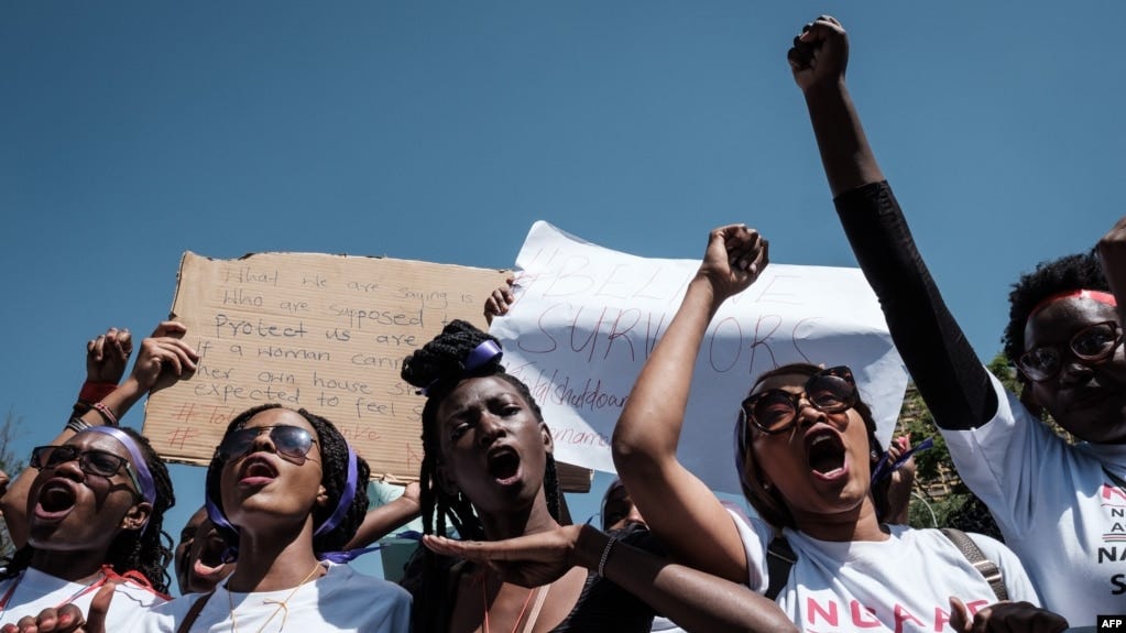 Kenyan women shout slogans as they participate in a feminist march against gender-based violence in Nairobi, March 8, 2019.