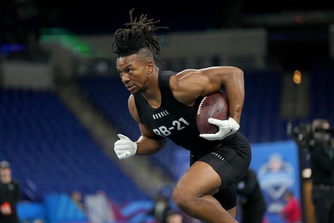 Former Texas star Bijan Robinson shines at NFL draft scouting combine