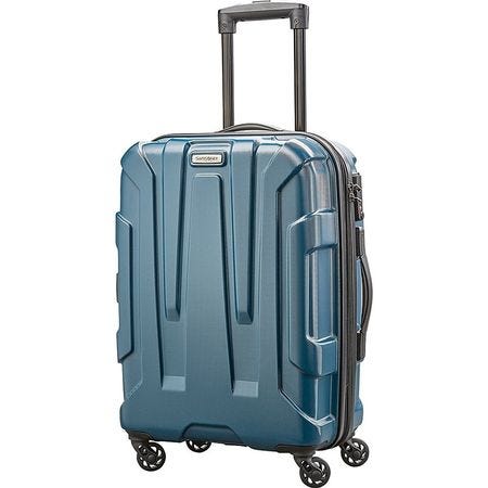 a blue carry-on luggage on wheels