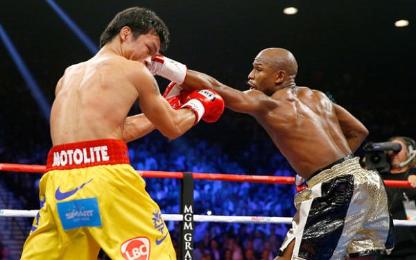 mayweather jabs pacquiao eye 2015