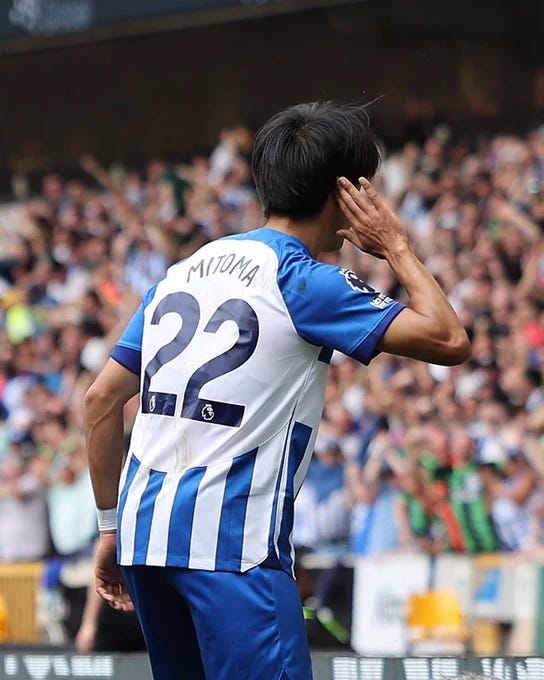 Kaoru cups his ear in front of the Albion fans after his amazing goal today. Special, special player.