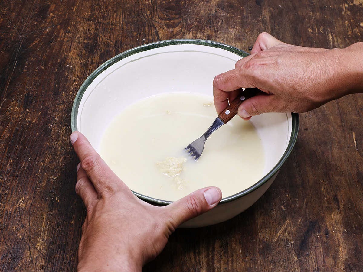 mixing masa with fork