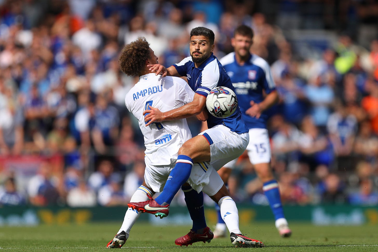 Sam Morsy and Ethan Ampadu fight for the ball in midfield, August 2023