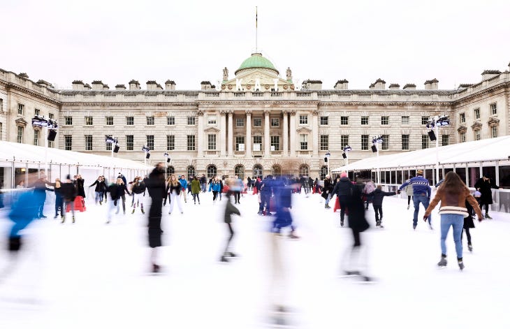 People ice skating outside Somerset House