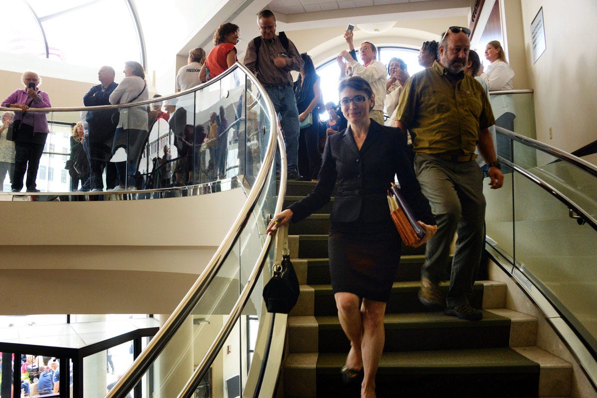 Attorney Bobbie Anne Cox Descending the Staircase After Delivering Oral Arguments
