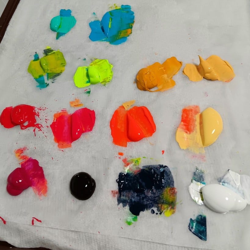Paint palette with bright globs of paint and smudges Embracing Imperfection