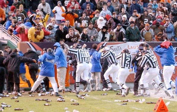 cleveland bengals fans throw beer bottles on nfl field images