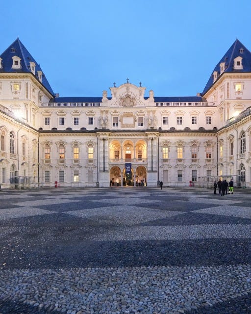 May be an image of 6 people, castle and the Brandenburg Gate