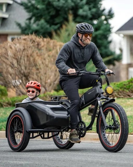 A leisure ride with father and son in the MOD Easy SideCar 3 electric bike. 