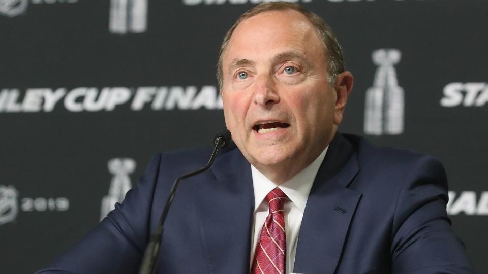 Gary Bettman talking at a press conference.