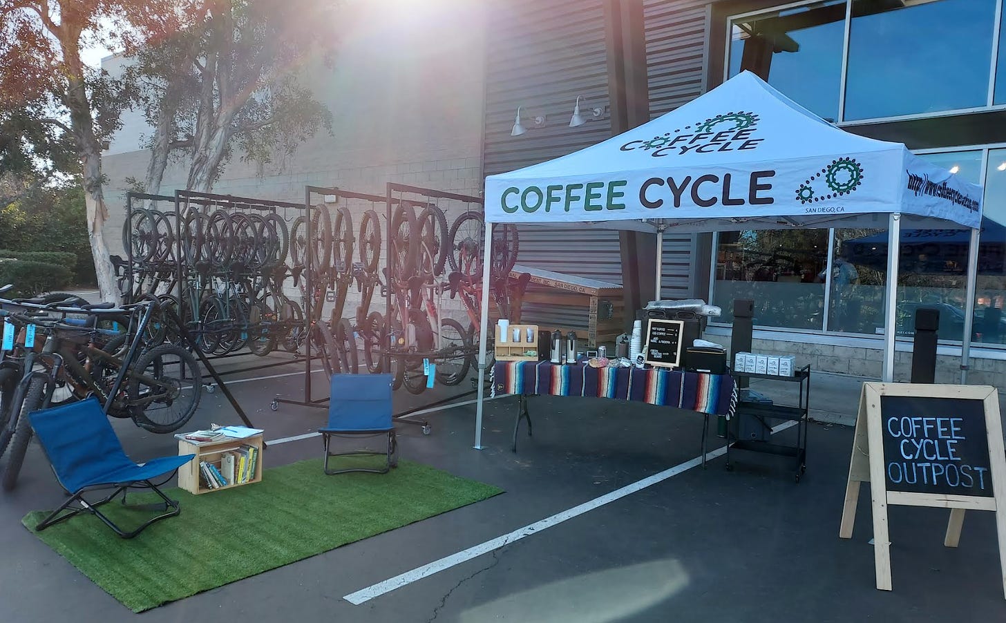 A coffee pop-up in front of the bike racks at REI outdoor store.