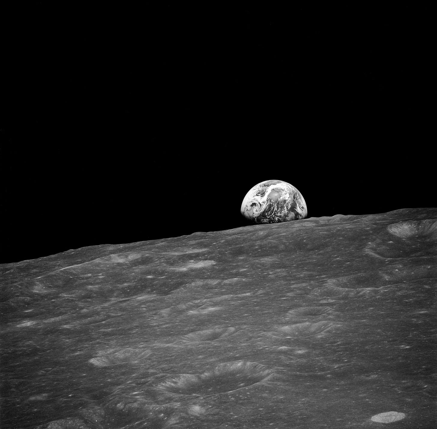 The Earthrise Photo: A Journey Through Iconic Space Portrait ...