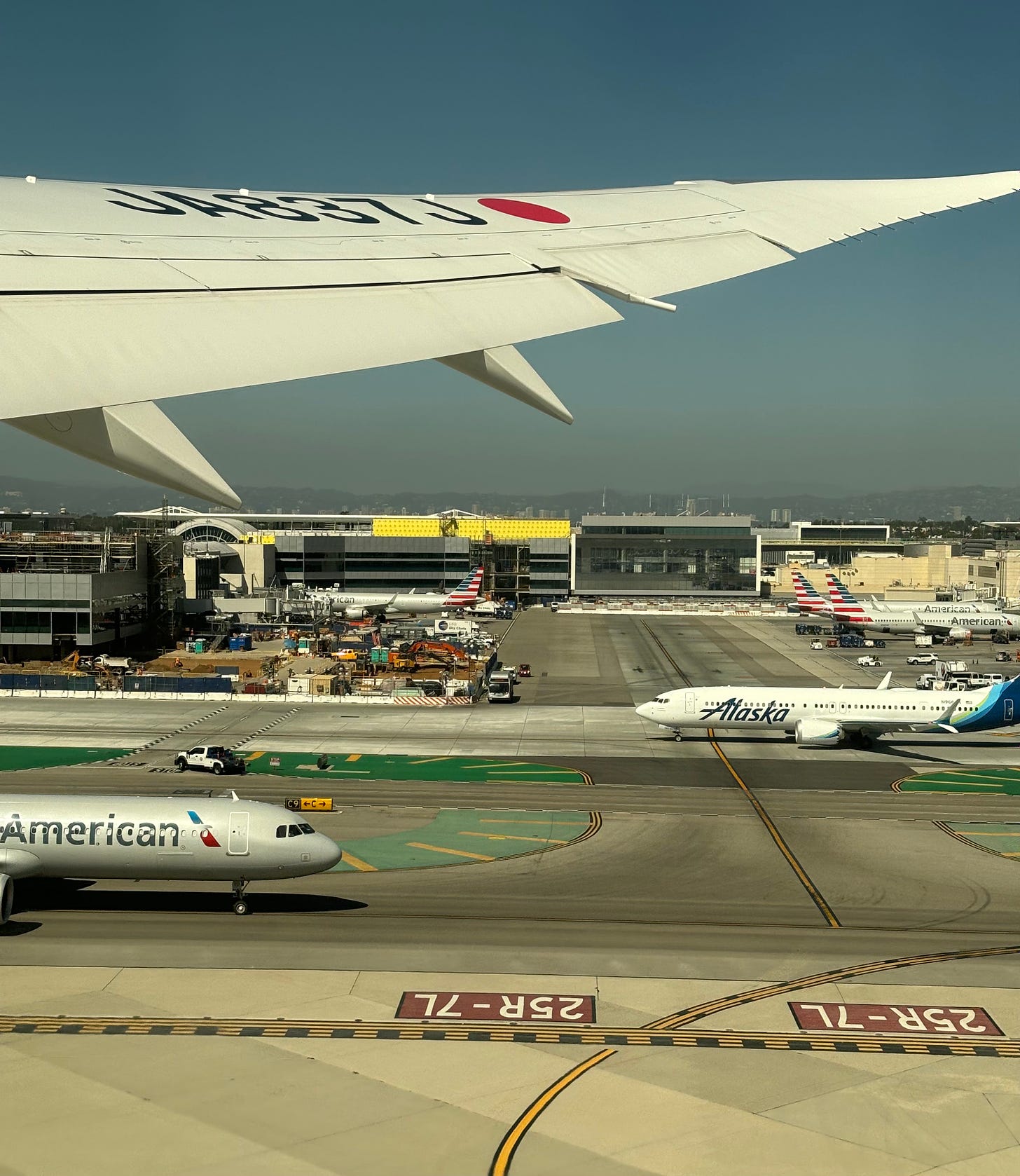 View from window seat as JAL departs LAX for Tokyo Narita