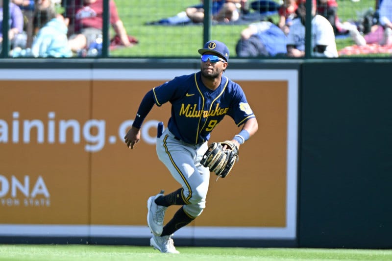 GLENDALE, ARIZONA - MARCH 24, 2023: Jackson Chourio #94 of the Milwaukee Brewers fields a fly ball during the seventh inning of a spring training game against the Los Angeles Dodgers at Camelback Ranch on March 24, 2023 in Glendale, Arizona. (Photo by David Durochik/Diamond Images via Getty Images)