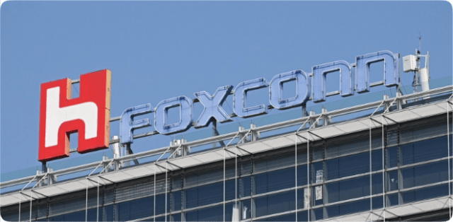 The logo of electronics contract manufacturer Foxconn Technology Group, formally known as Hon Hai Precision Industry, is displayed at its headquarters in Taipei. Photo: Agence France-Presse