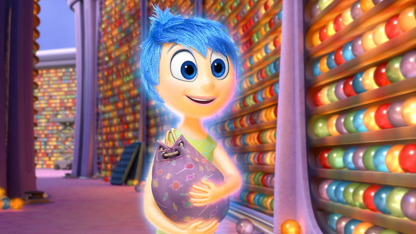 Inside Out | Still features Joy holding a bag of memories.
