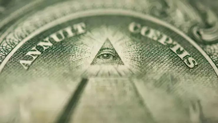 The Philadelphia Federal Reserve claims Freemasons Henry Wallace and Franklin D. Roosevelt chose the Eye of Providence when they redesigned the dollar bill in 1934 (history.com / Getty Images)