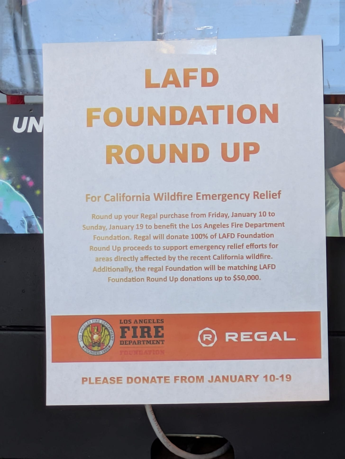 This is a notice for film goers that Regal foundation for a period of time in the past would give rounded up donations off purchases to support emergency relief efforts.