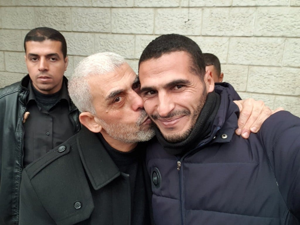 Hassan Eslaiah, an AP/CNN photographer, with Hamas leader Yahya Sinwar in an undated photo.