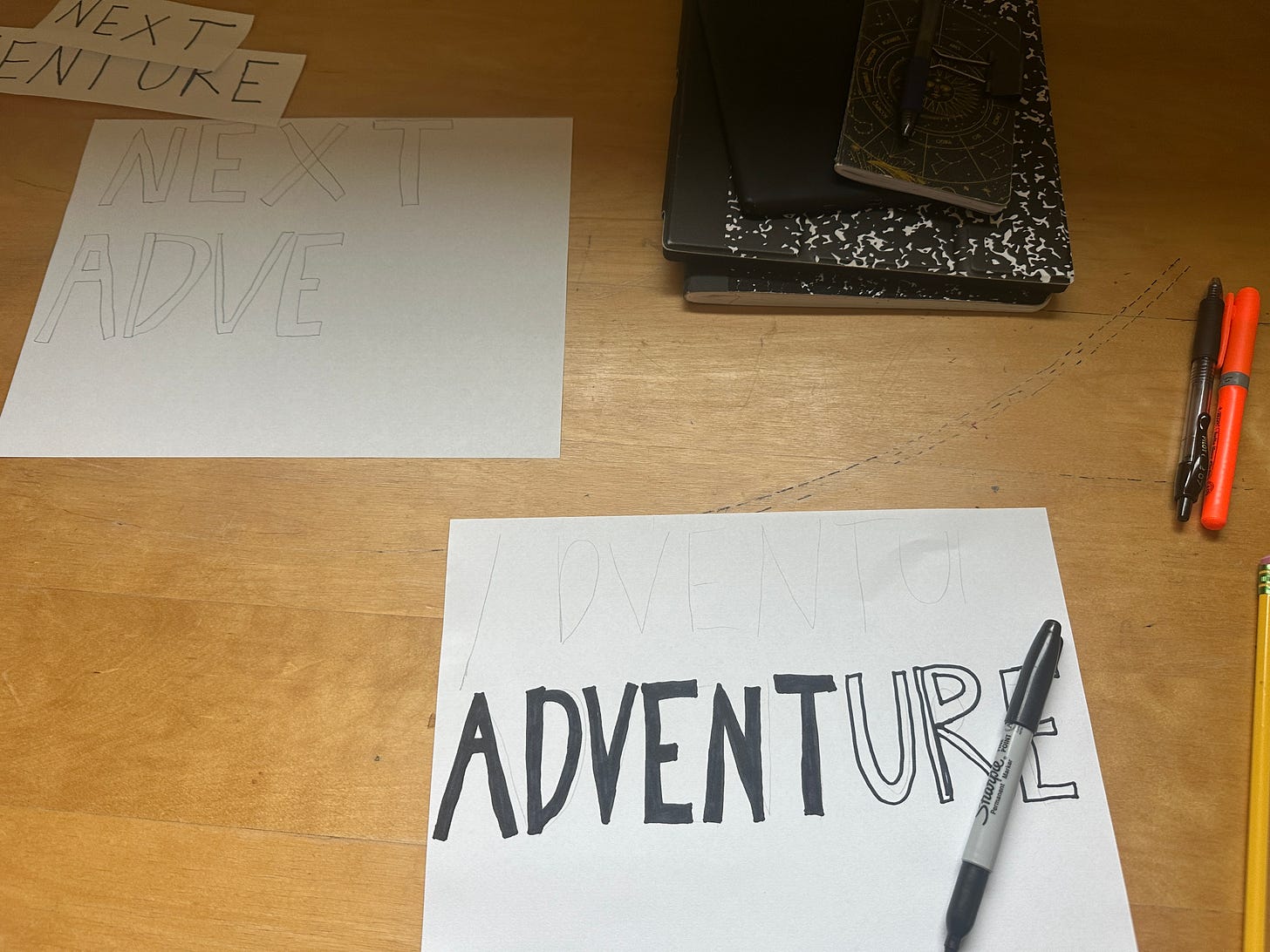 Design process for redesigning the Next Adventure logo involved writing the letters on a piece of paper. Design process for redesigning the Next Adventure logo involved writing the letters on a piece of paper.