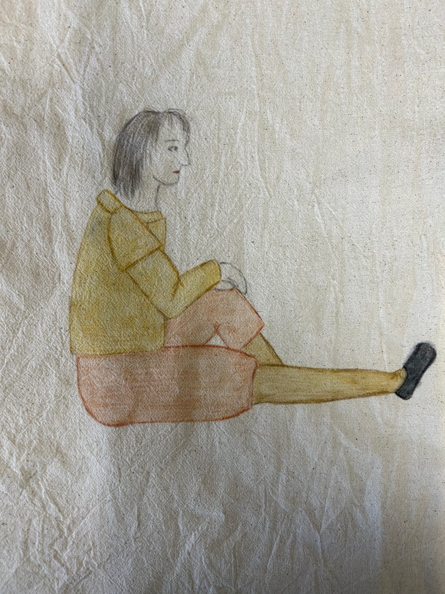 An image of a young man seated on the ground, drawn onto fabric. He is dressed in dull coloured 16th century dress with unkempt hair