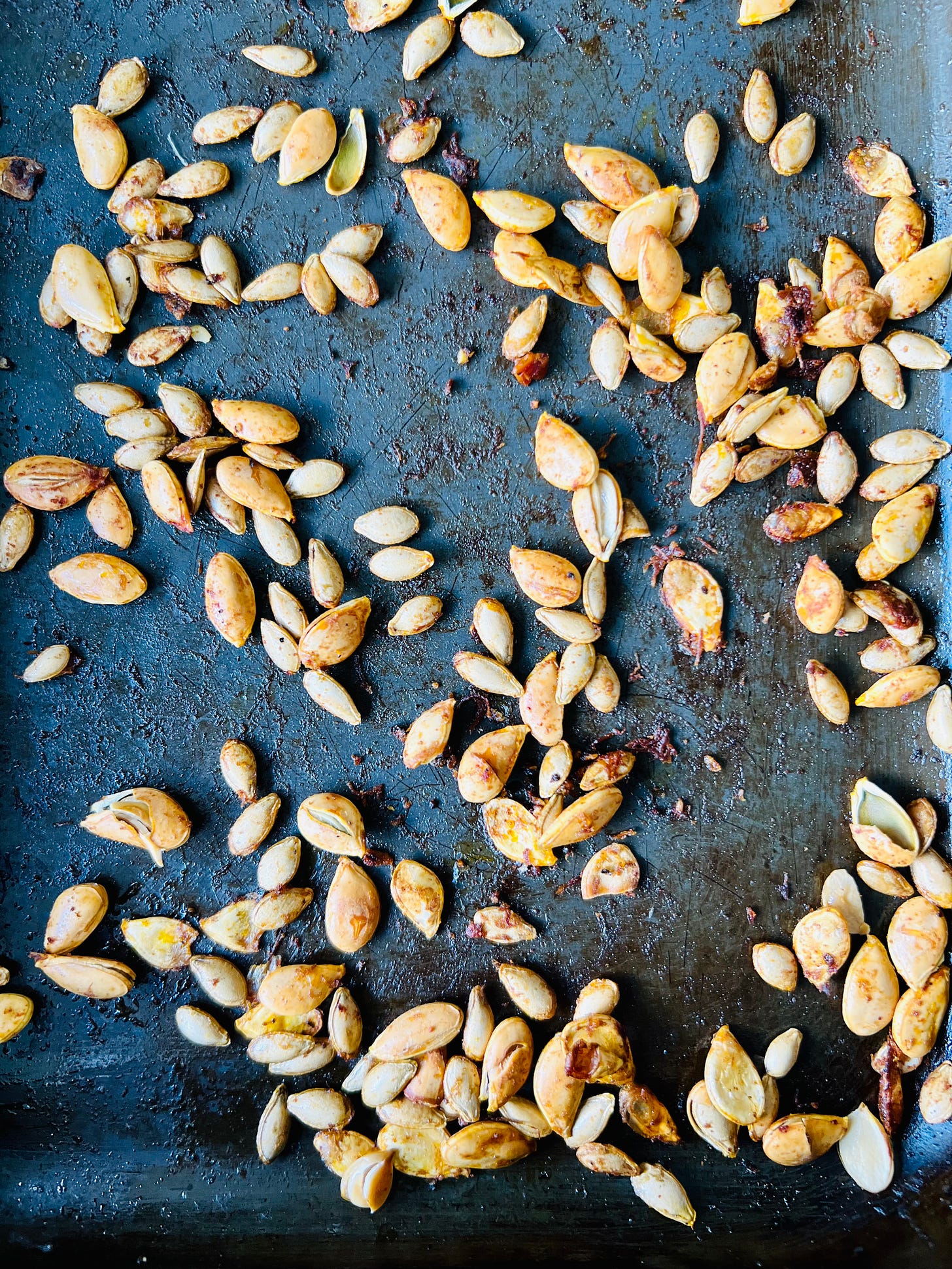 A tray of spicy roasted pumpkin seeds