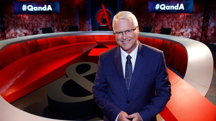 Tony Jones standing infront of Q&A studio panel