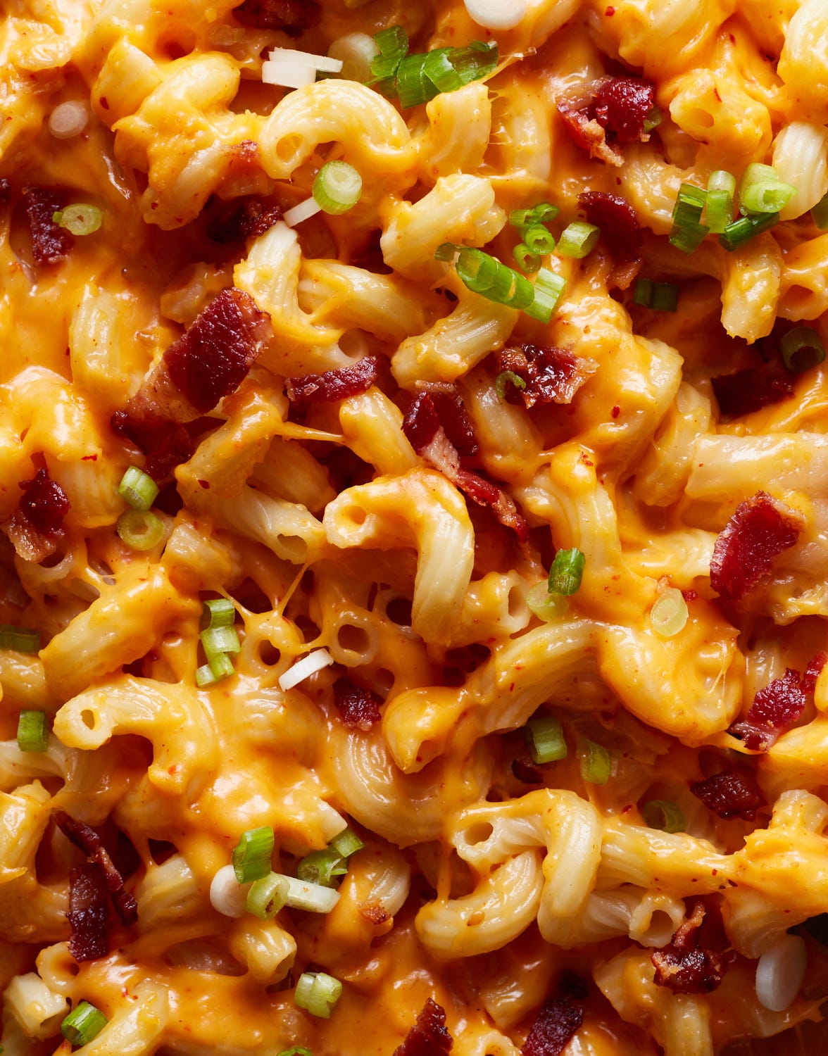 Kimchi mac and cheese with bacon and scallions on top