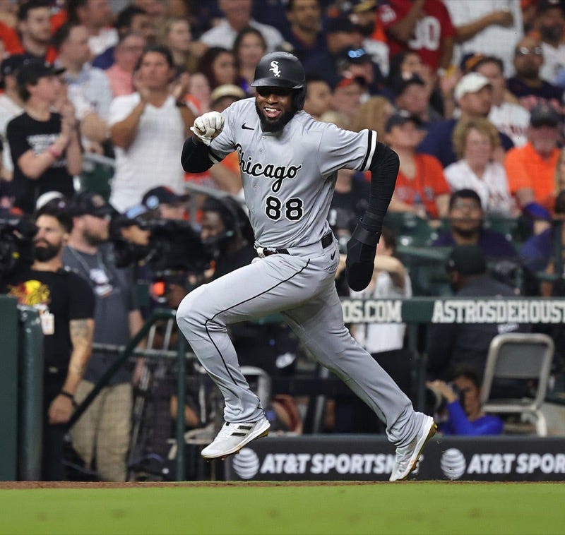 Luis Robert Jr. #88 of the Chicago White Sox celebrates a double