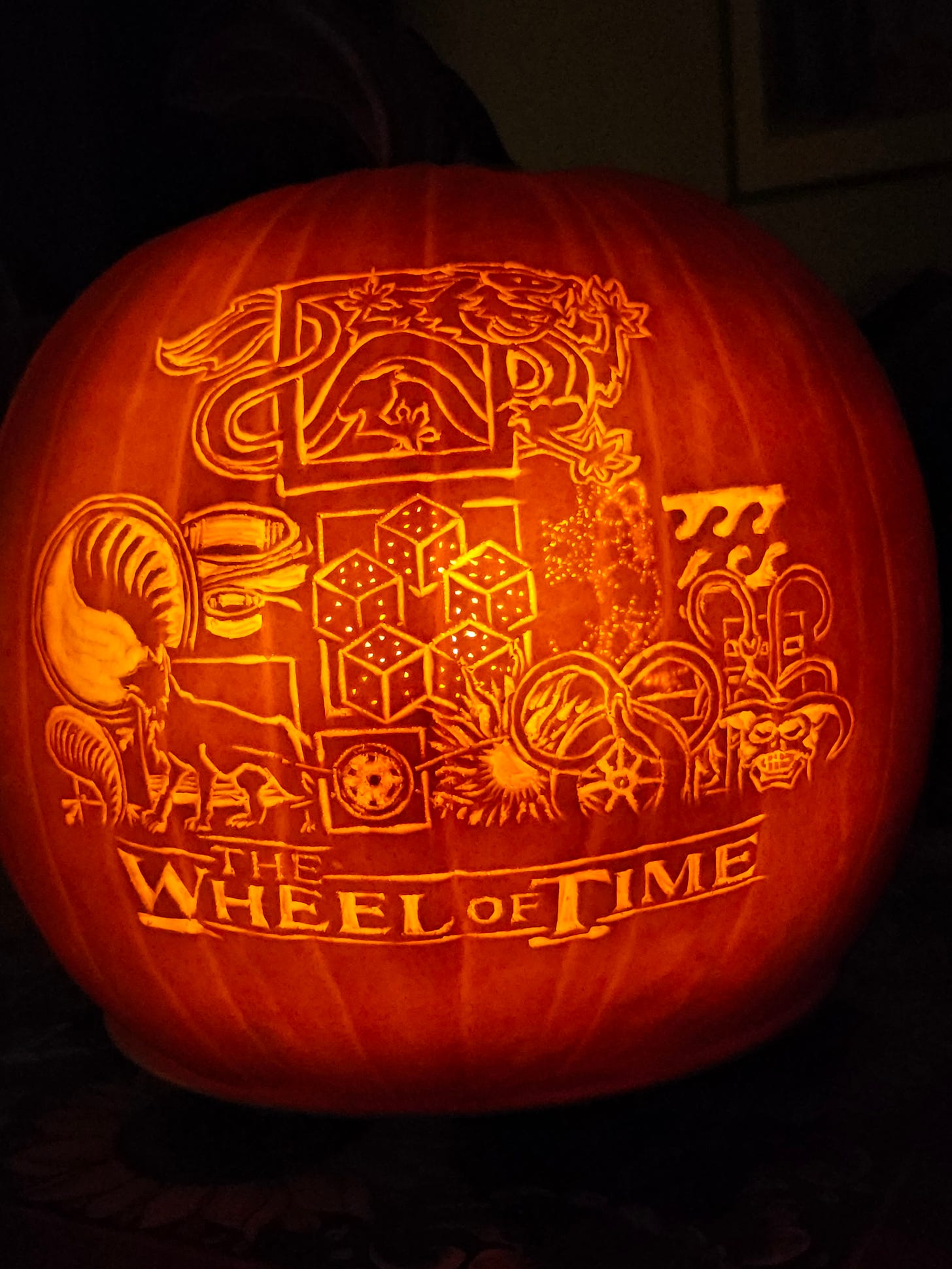 Pumpkin carved with motifs from the Wheel of Time. Based on a design by Reddit user Mahranaka, used by kind permission.