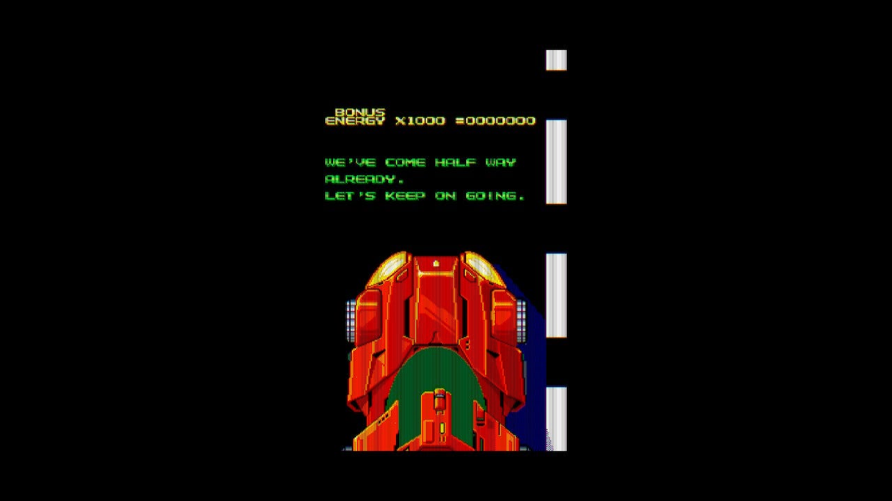 A screenshot from the mid-game congratulations screen that awards you an energy bonus if applicable, and has Mac saying, "We've come half way already. Let's keep on going." Below is your red vehicle, in its car form, driving up the screen and off of it.