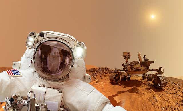 Are astronauts worth tens of billions of dollars in extra costs to go to  Mars?