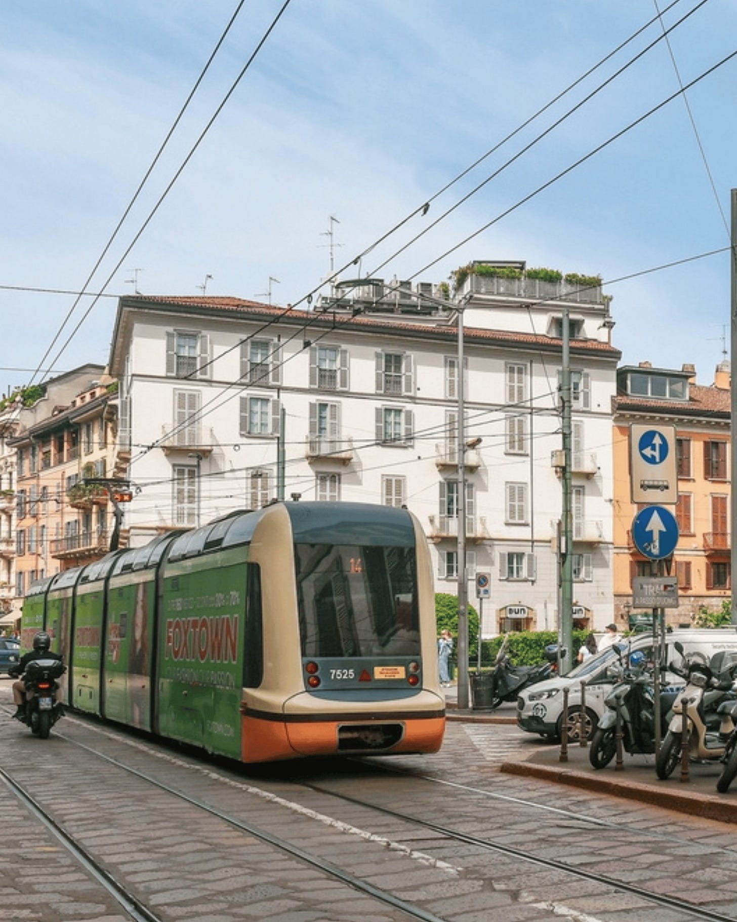 May be an image of 2 people, cablecar, trolley and text